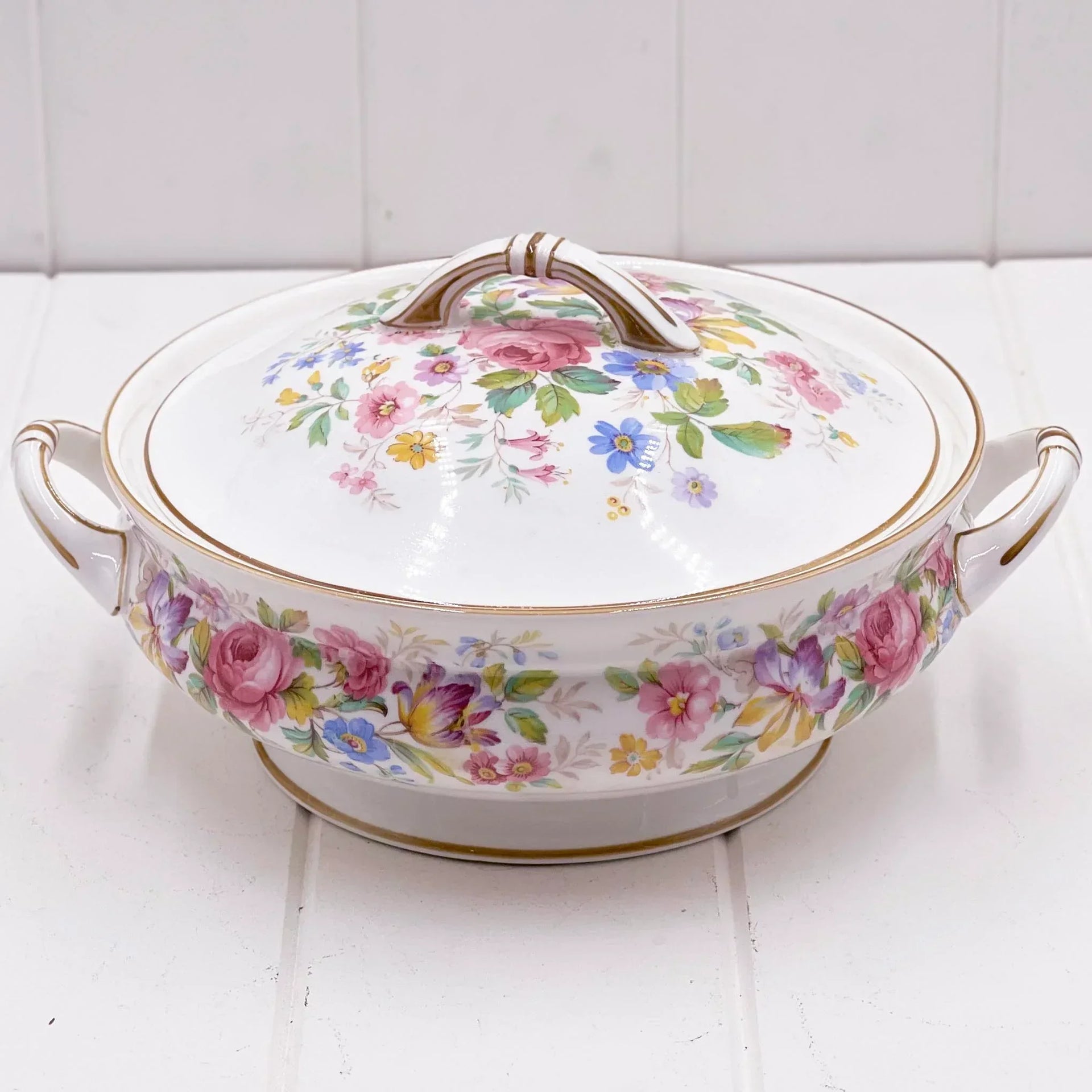 Elegant floral porcelain serving dish with lid, vintage-style home decor, gold trim, pink roses & blue flowers