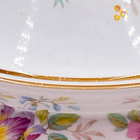 Vintage floral porcelain plate with gold trim, delicate hand-painted flowers and leaves, elegant home décor accent