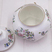 Elegant porcelain jar with floral and bird motifs, gold trim, vintage home decor