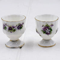 Elegant porcelain egg cups with purple violet floral design and gold trim, vintage homeware decor