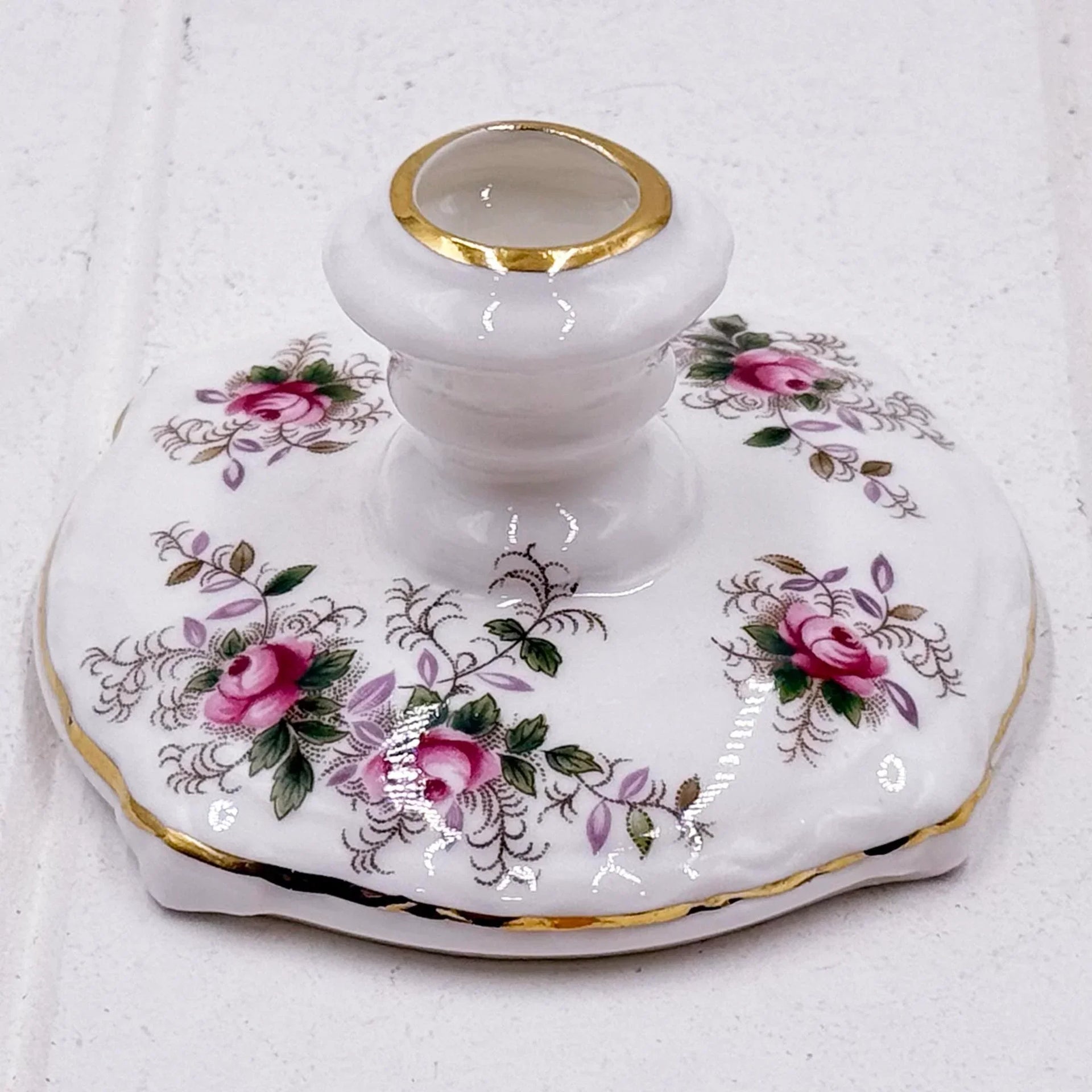 Elegant porcelain candle holder with pink rose floral design and gold trim, vintage home décor accent