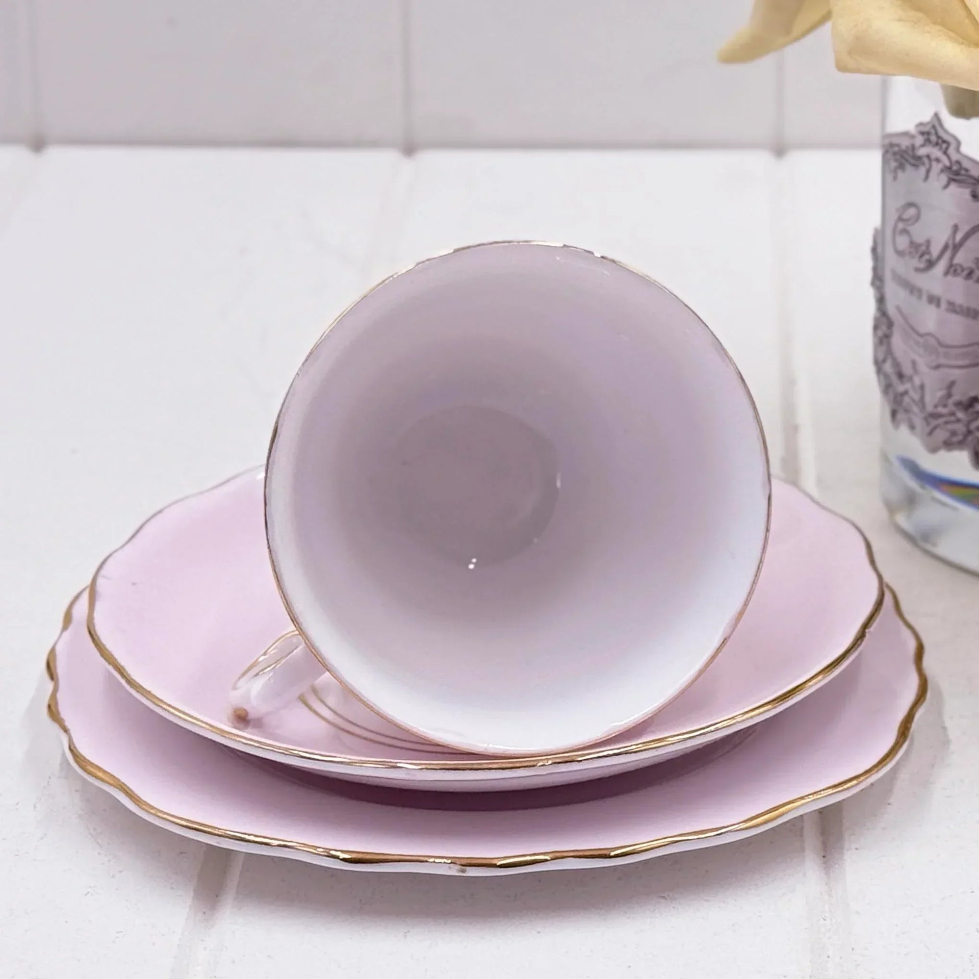 Delicate pink porcelain teacup with gold trim, vintage-style home décor for elegant tea service