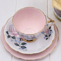 Pink floral teacup and saucer with gold trim, vintage-style home décor
