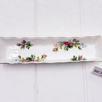 Elegant floral porcelain tray with gold trim, perfect for vintage home décor and serving