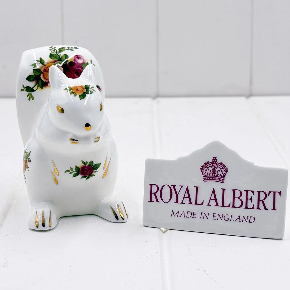 Royal Albert porcelain squirrel figurine with floral design, made in England, elegant home decor accent