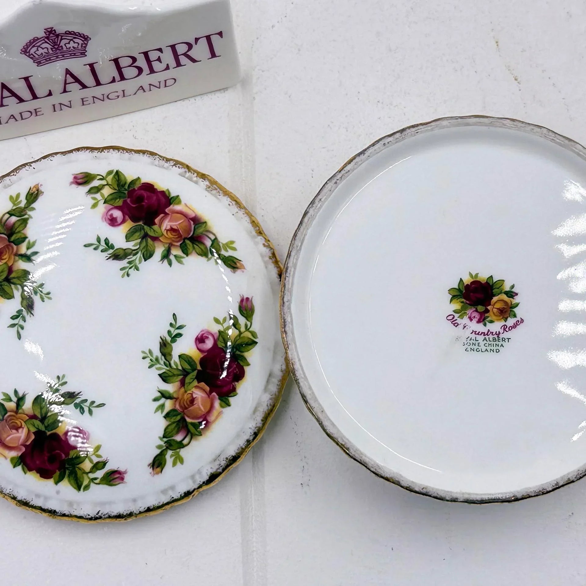 Royal Albert Old Country Roses plate with floral design and gold trim, vintage English bone china