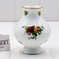 Elegant white porcelain vase with hand-painted roses and gold trim, vintage home decor accent