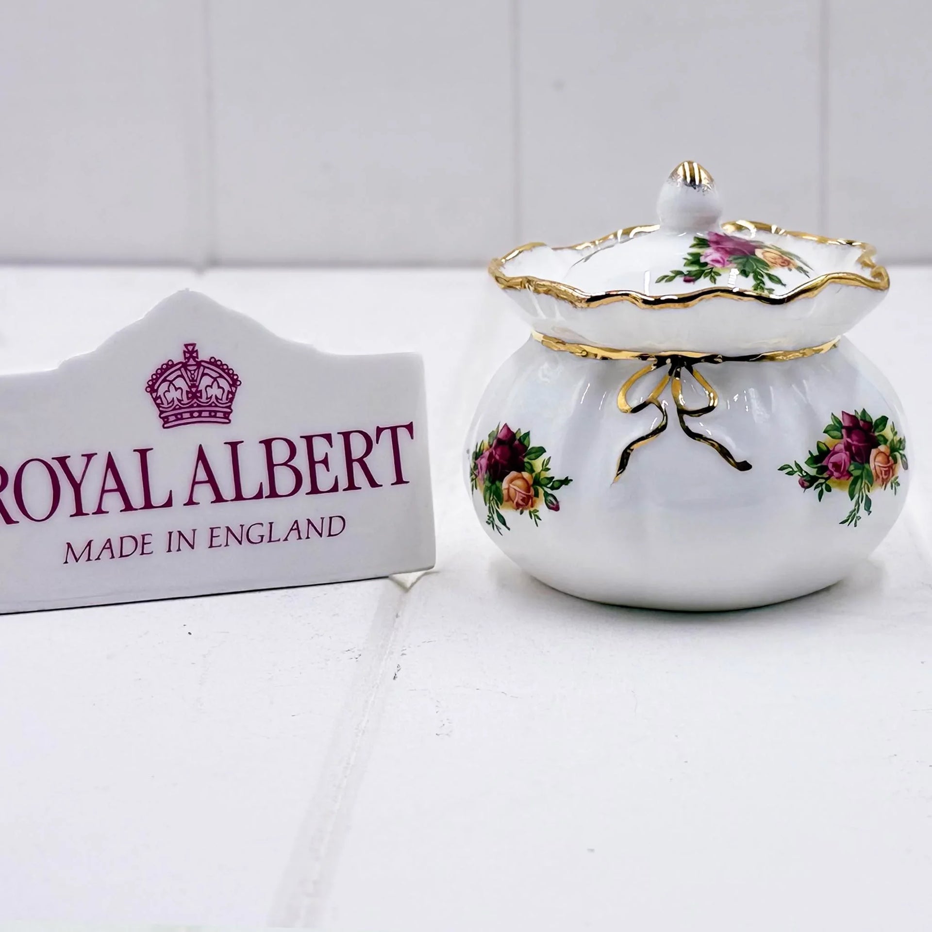 Royal Albert porcelain trinket box with floral roses and gold trim, made in England