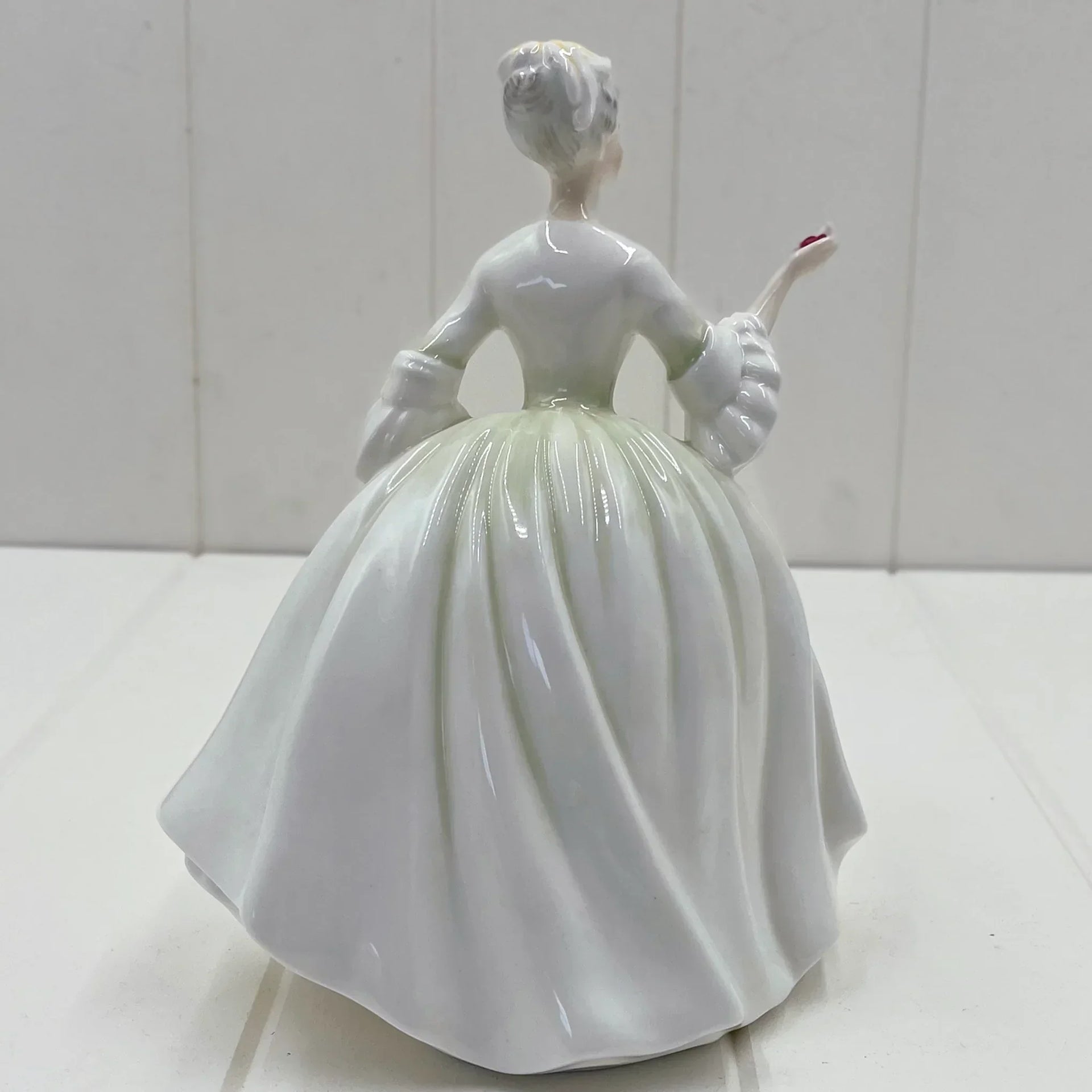 Elegant white porcelain figurine of a lady in ball gown, vintage home décor accent piece