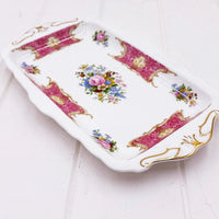 Elegant porcelain tray with floral bouquet, pink damask, and gold trim for vintage home décor