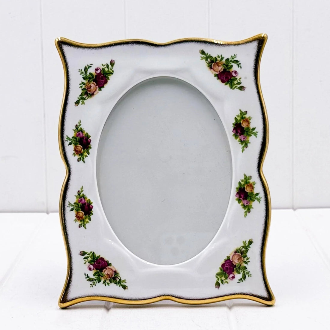 Elegant porcelain photo frame with floral rose design and gold trim, vintage home décor accent
