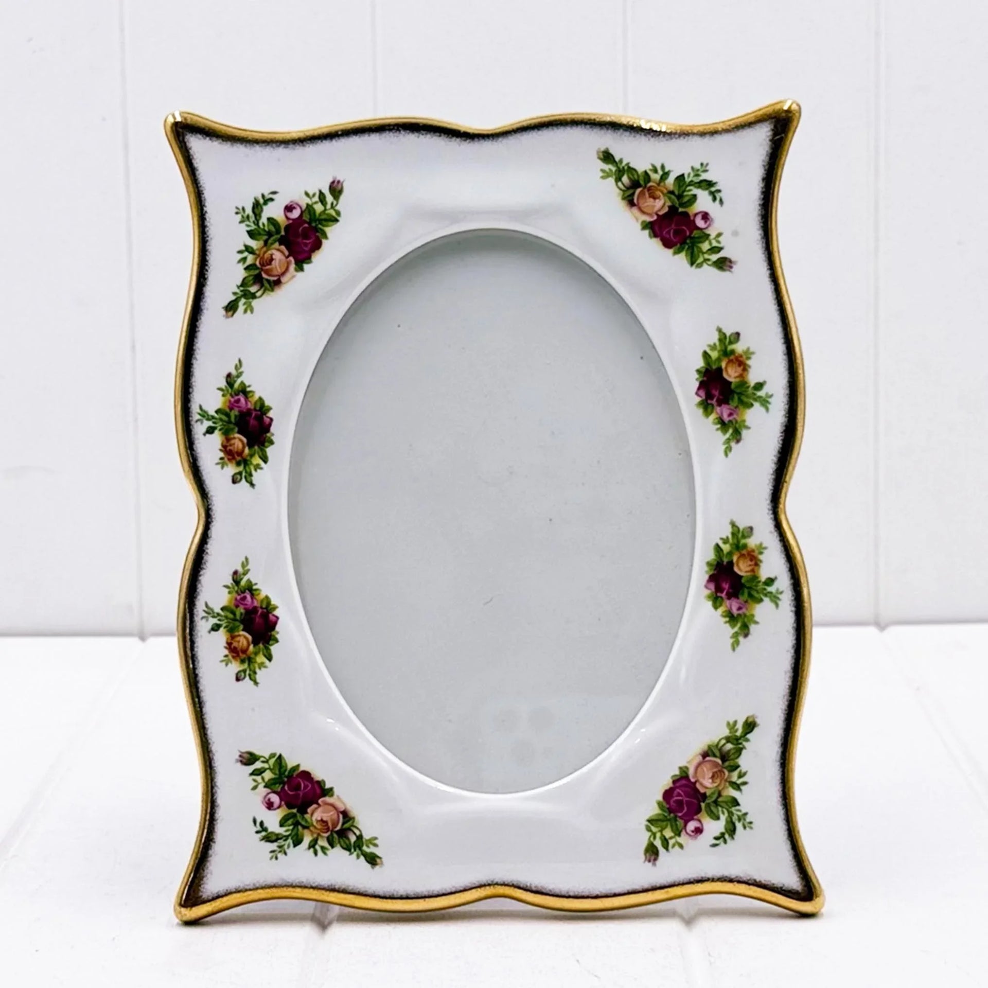 Elegant porcelain photo frame with floral rose design and gold trim, vintage home décor accent