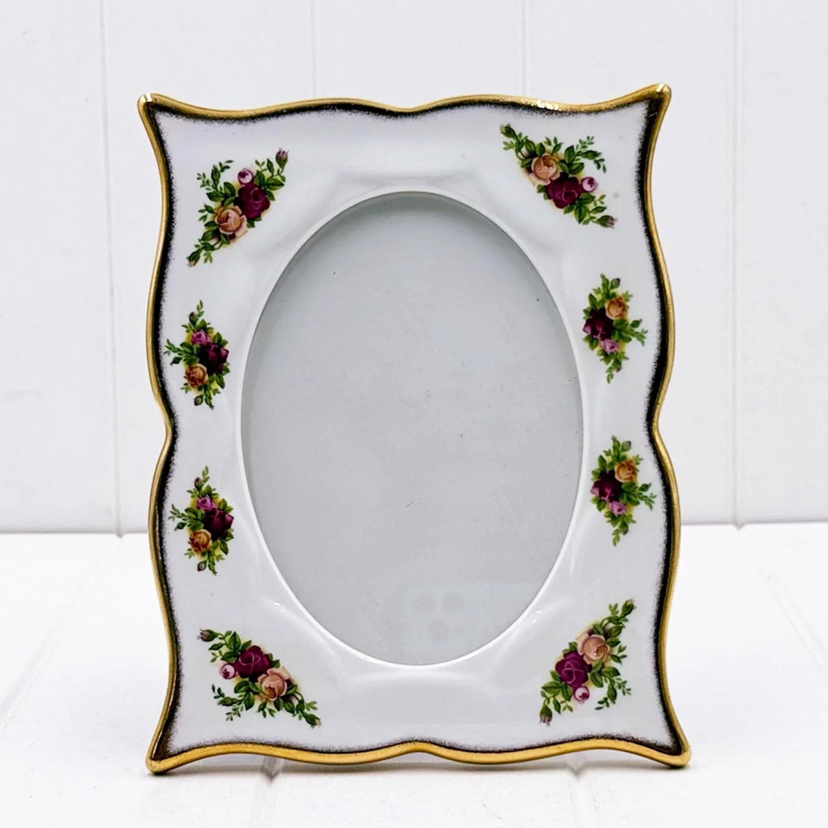 Elegant porcelain photo frame with floral rose design and gold trim, vintage home décor accent