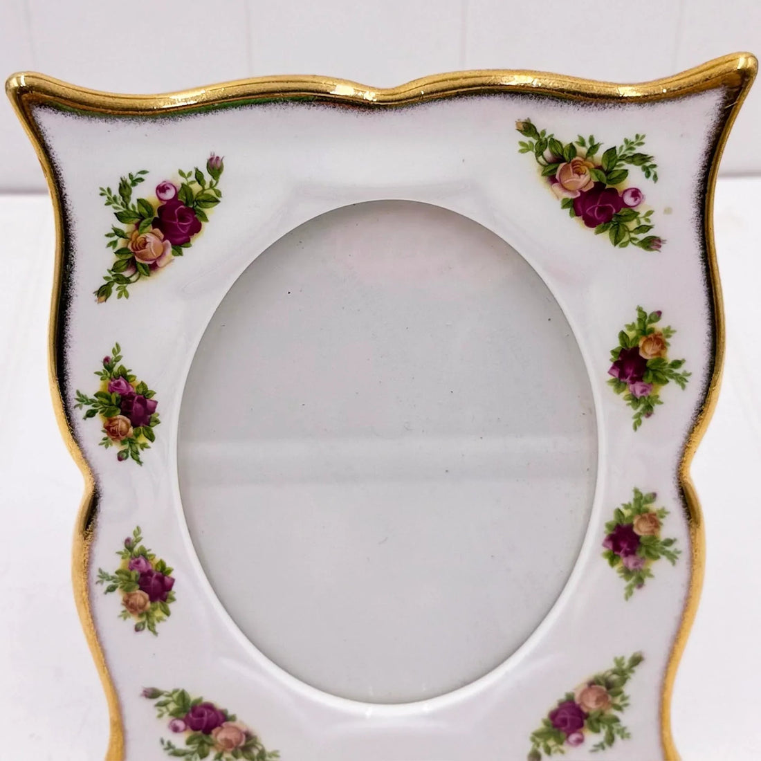 Elegant porcelain photo frame with gold trim and floral rose design, vintage home décor accent
