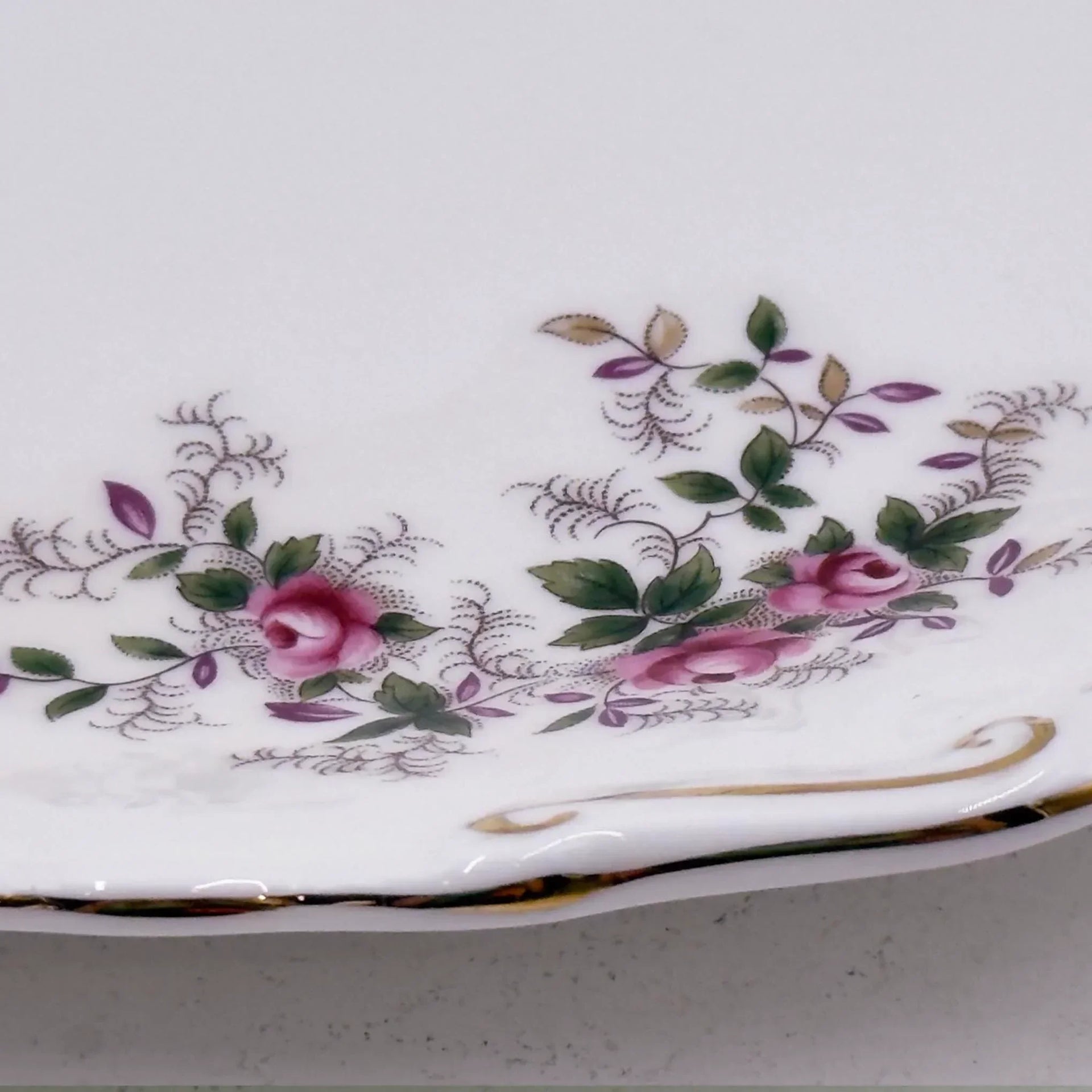 Elegant porcelain plate with pink rose floral design and gold trim, vintage home décor accent