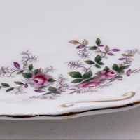 Elegant porcelain plate with pink rose floral design and gold trim, vintage home décor accent