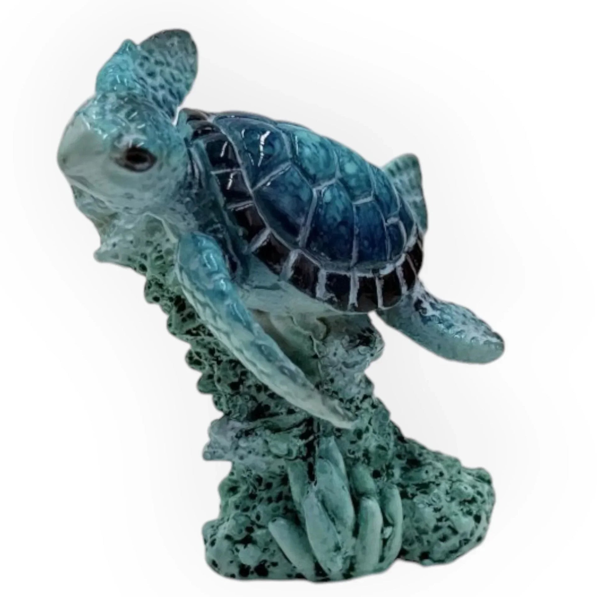 Blue sea turtle figurine on coral base, coastal home décor accent piece