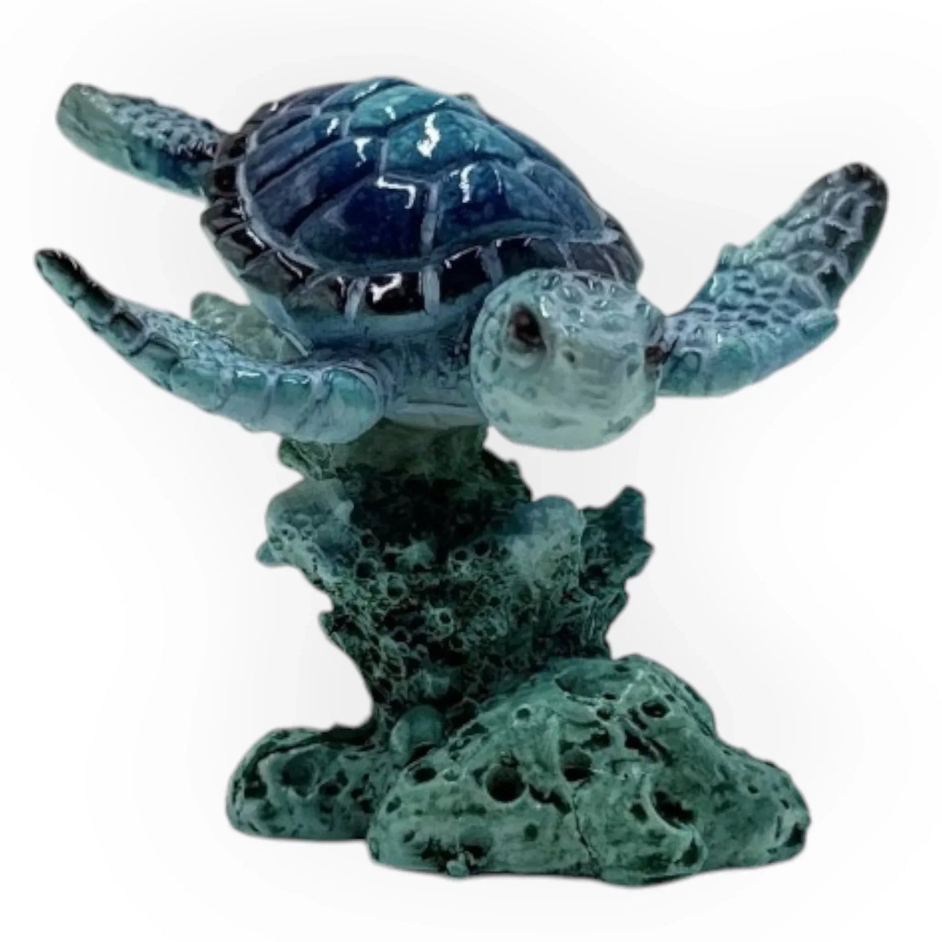 Blue sea turtle figurine on coral base, coastal home décor accent piece