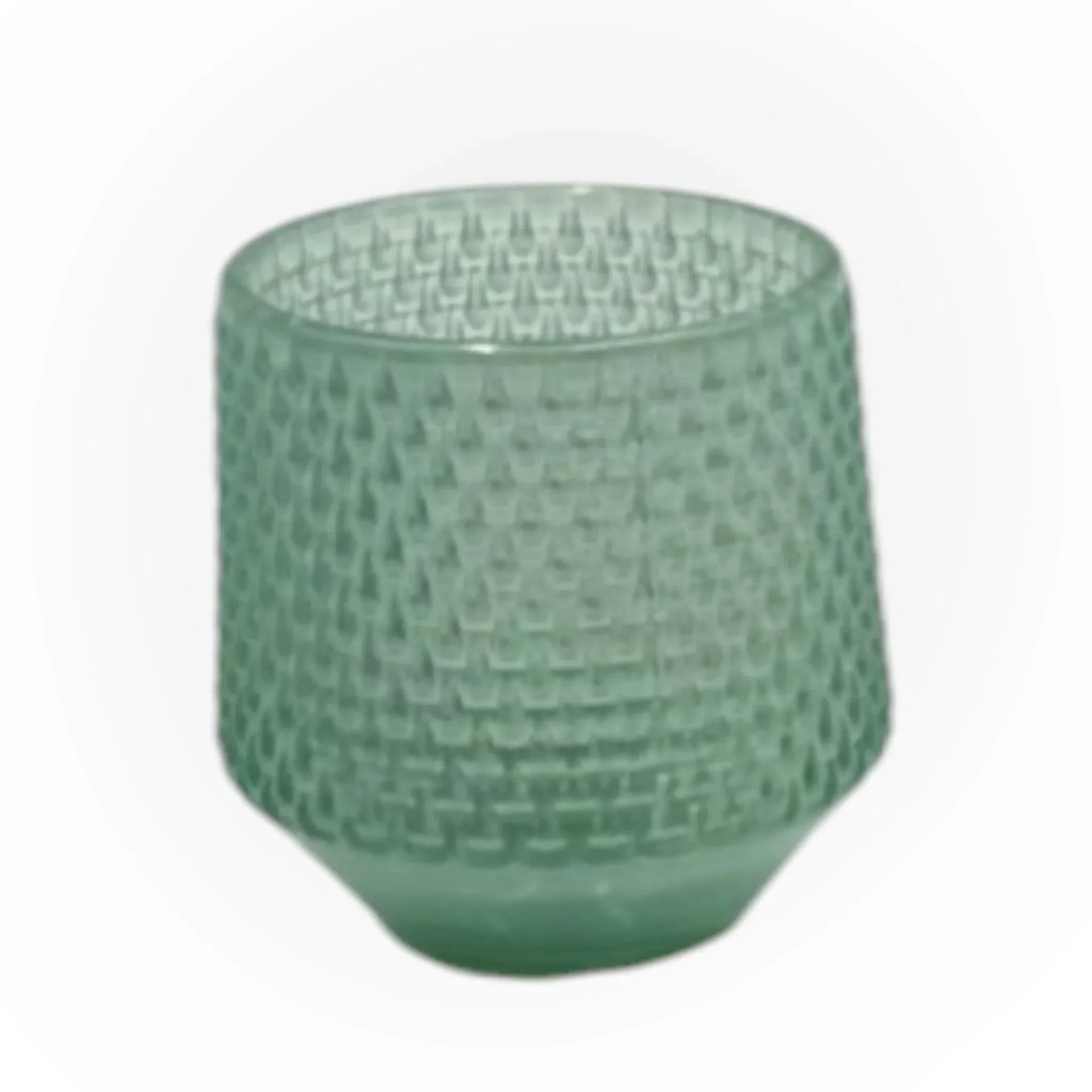 Mint green textured glass tumbler with geometric pattern, modern home décor accent piece