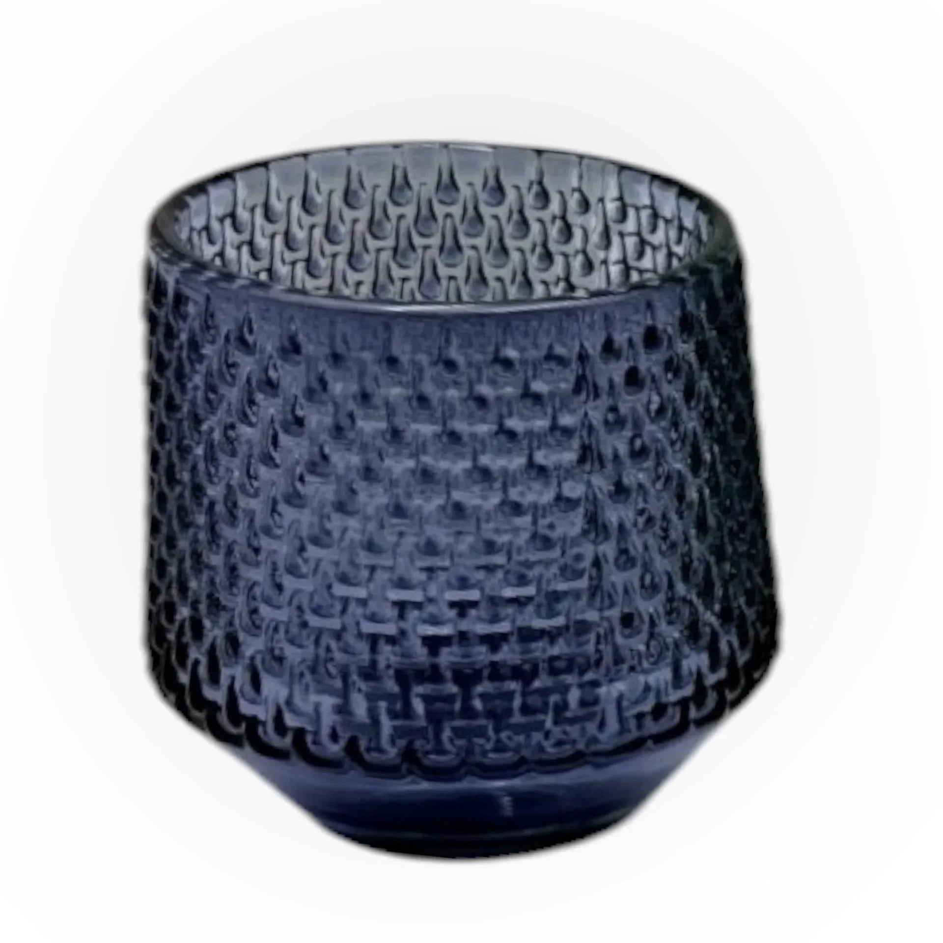 Dark blue textured glass tumbler with intricate woven pattern, ideal for elegant home décor and vintage-inspired table settings.