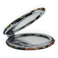 Floral pattern compact mirror with dual-sided design for home décor or travel use
