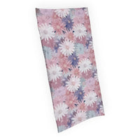 Pastel floral print towel with pink, white, and lavender daisies for home décor