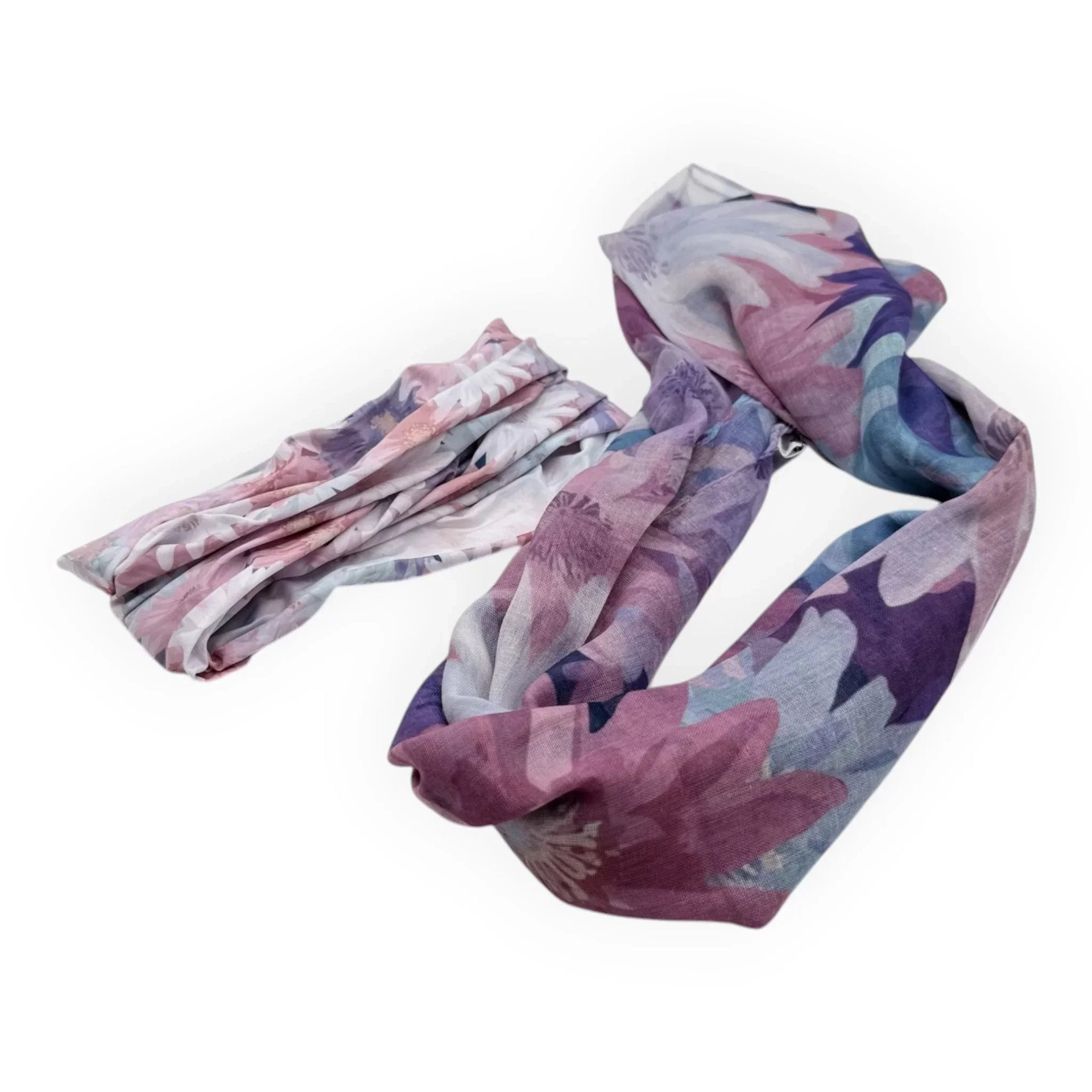 Elegant floral scarf in purple, pink, and blue hues, perfect for stylish home décor or fashion accessory.