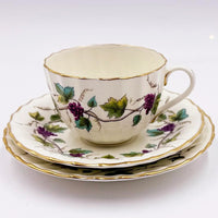 Vintage porcelain teacup and saucer set with grapevine pattern, gold trim, elegant home decor