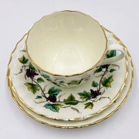 Vintage porcelain teacup and saucer set with grapevine design, gold trim, elegant home decor