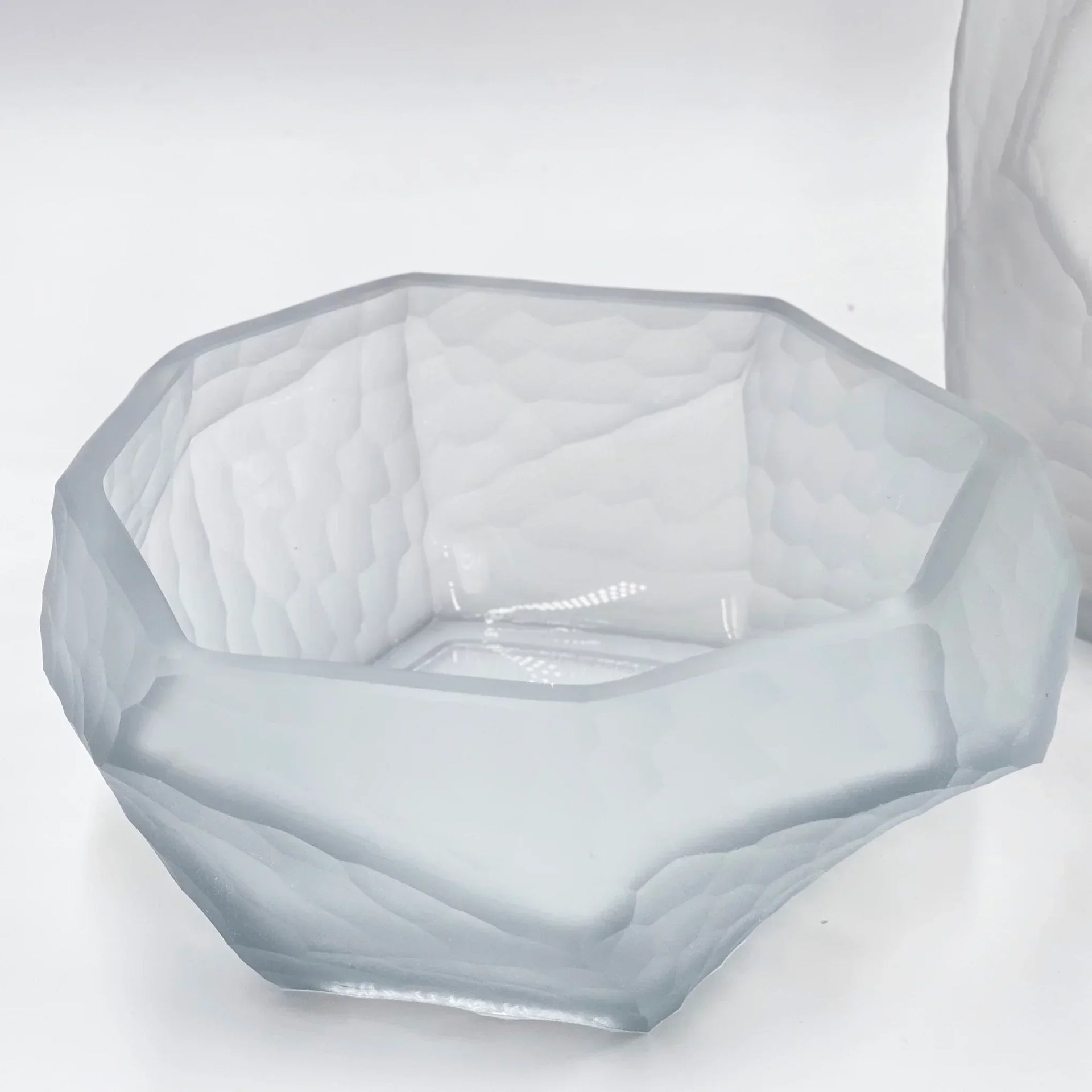 Frosted glass bowl with geometric facets, modern home decor accent piece