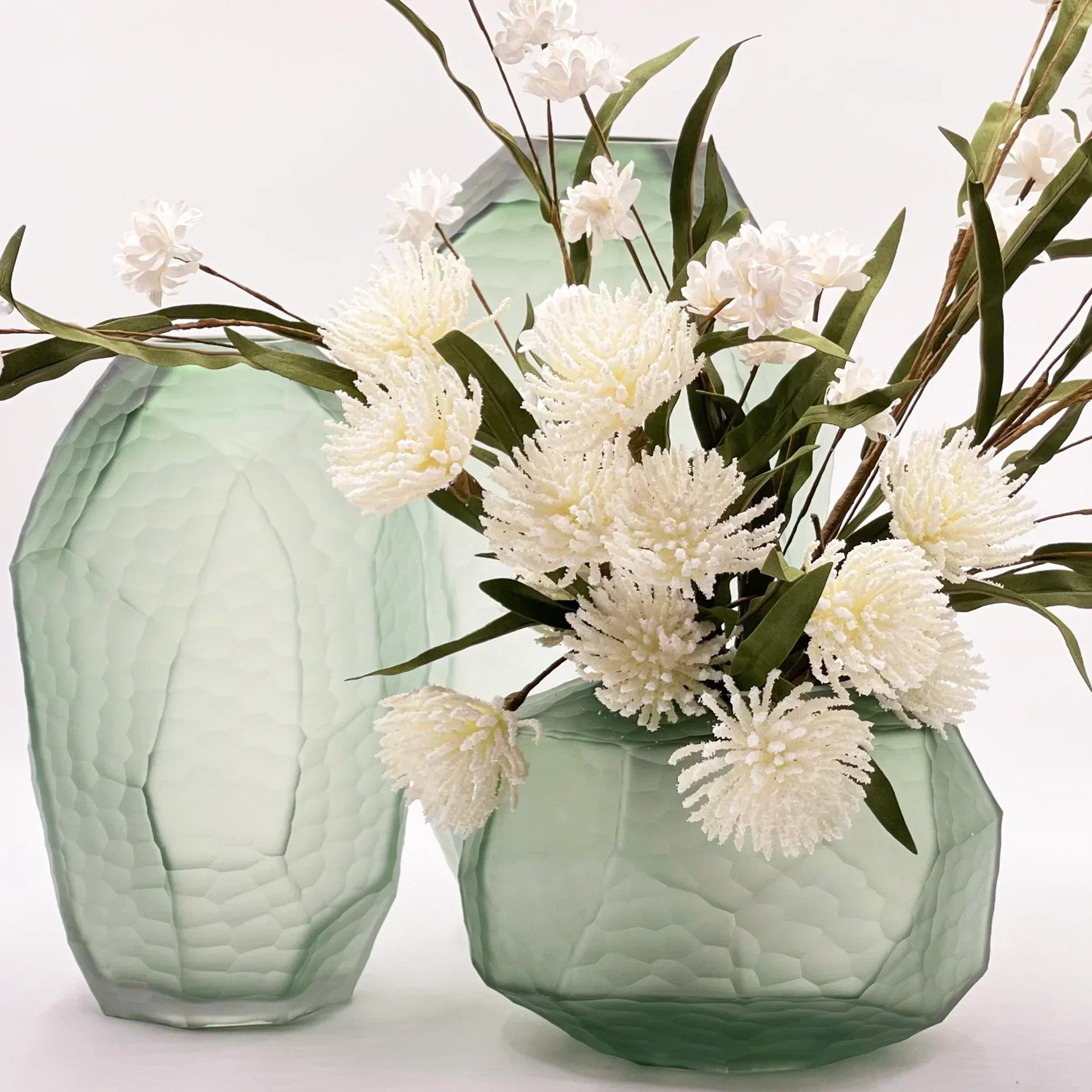 Mint green textured glass vases with white artificial flowers, elegant home décor accent pieces