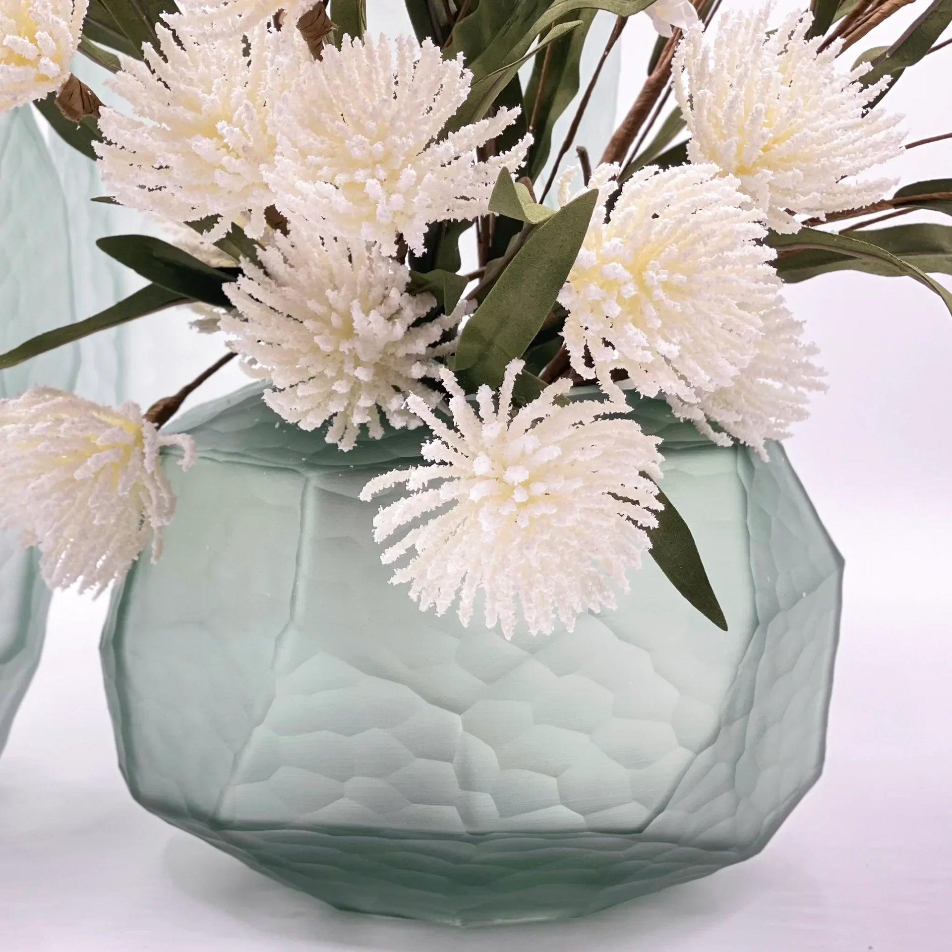Mint green textured vase with white frosted flowers, elegant home décor accent piece