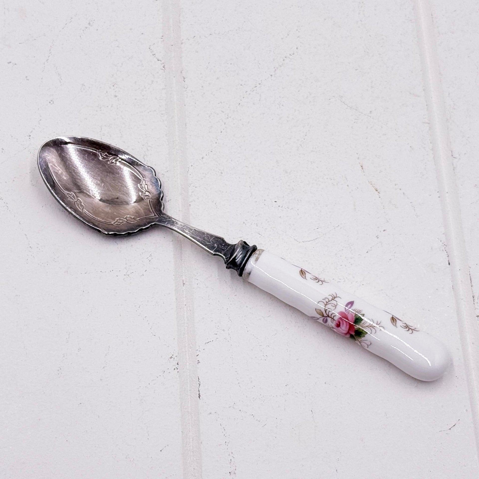 Royal Albert Lavender Rose jam spoon with silver plate bowl and porcelain handle featuring pink roses