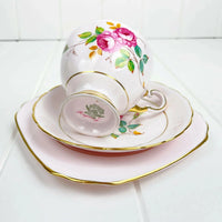 Elegant vintage tea cup and saucer set with pink rose floral design, gold trim, fine bone china
