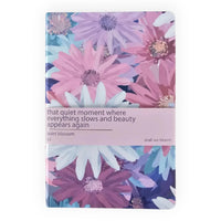 A5 floral notebook with 'quiet blossom' design, pastel pink and blue flowers, inspirational quote, perfect for home décor or journaling.