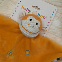 Baby Boo monkey comforter with soft orange blanket and embroidered circles, perfect for newborns