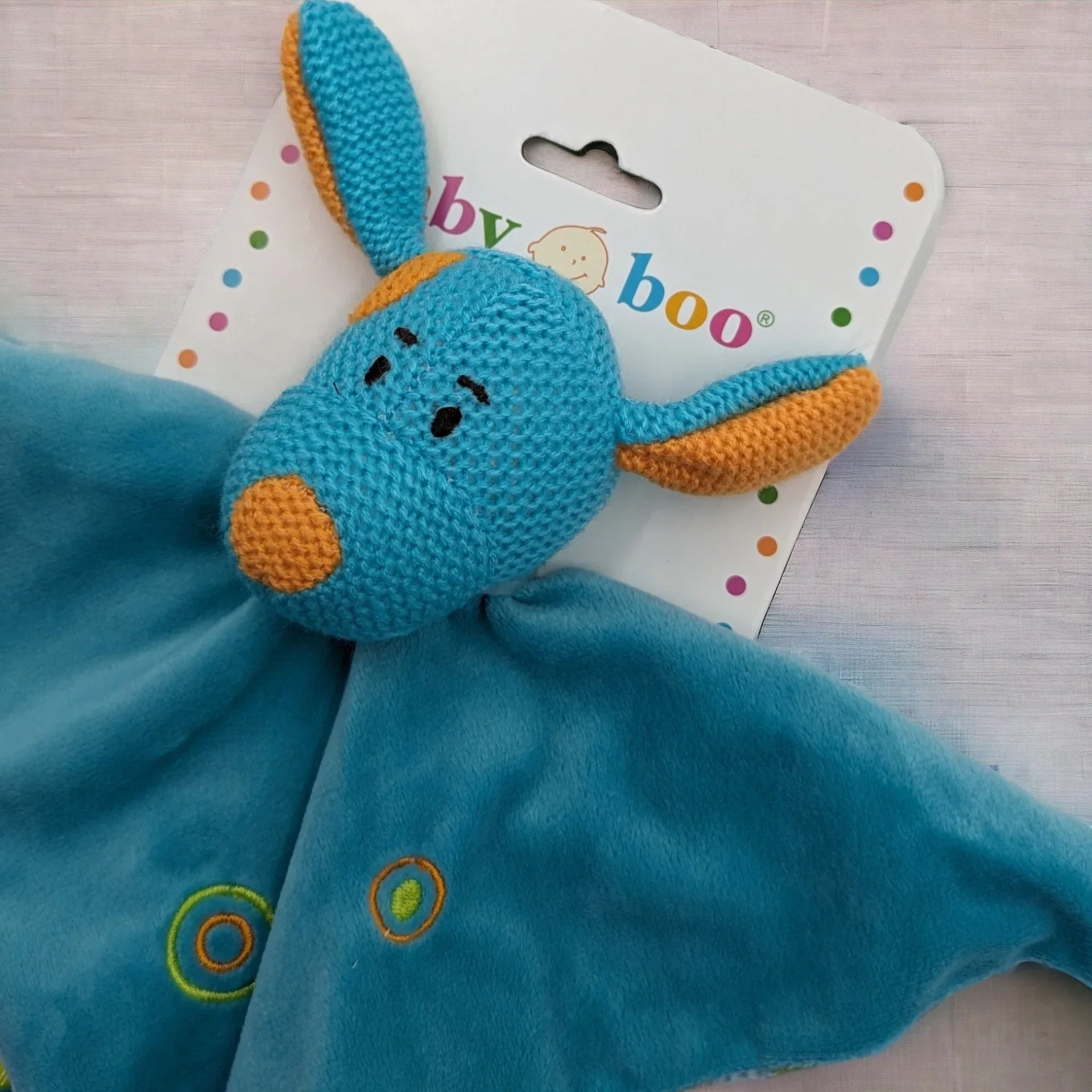 Blue knitted bunny comforter with soft fleece blanket, perfect baby gift