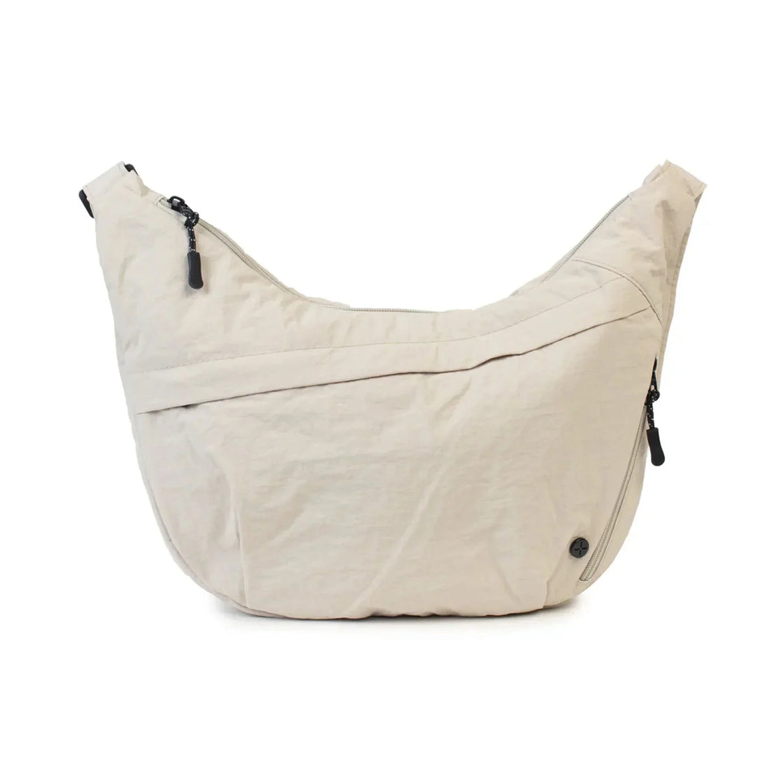 Beige hobo shoulder bag with black zippers and minimalist design, ideal for everyday carry