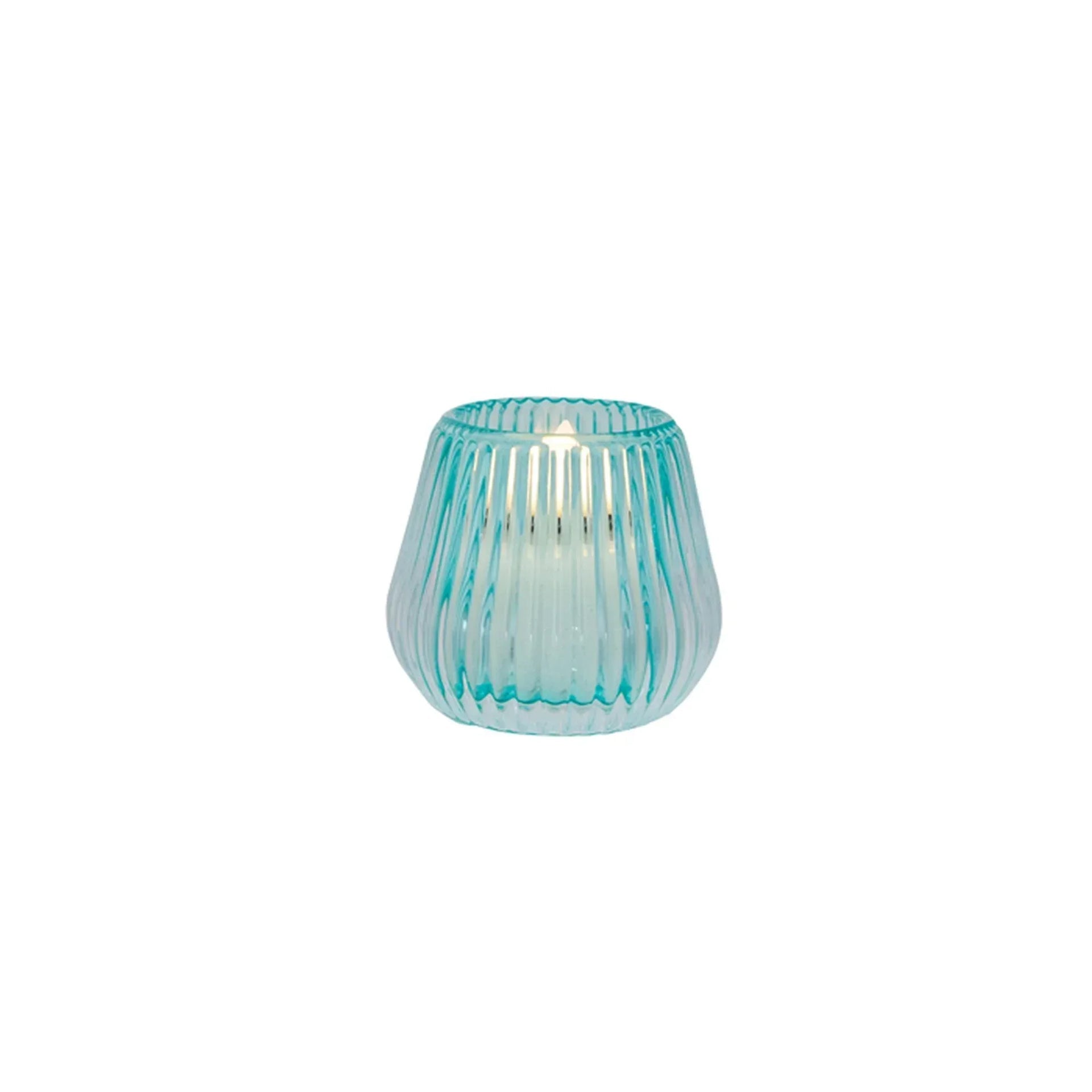 Turquoise ribbed glass candle holder with lit candle, elegant home décor accent