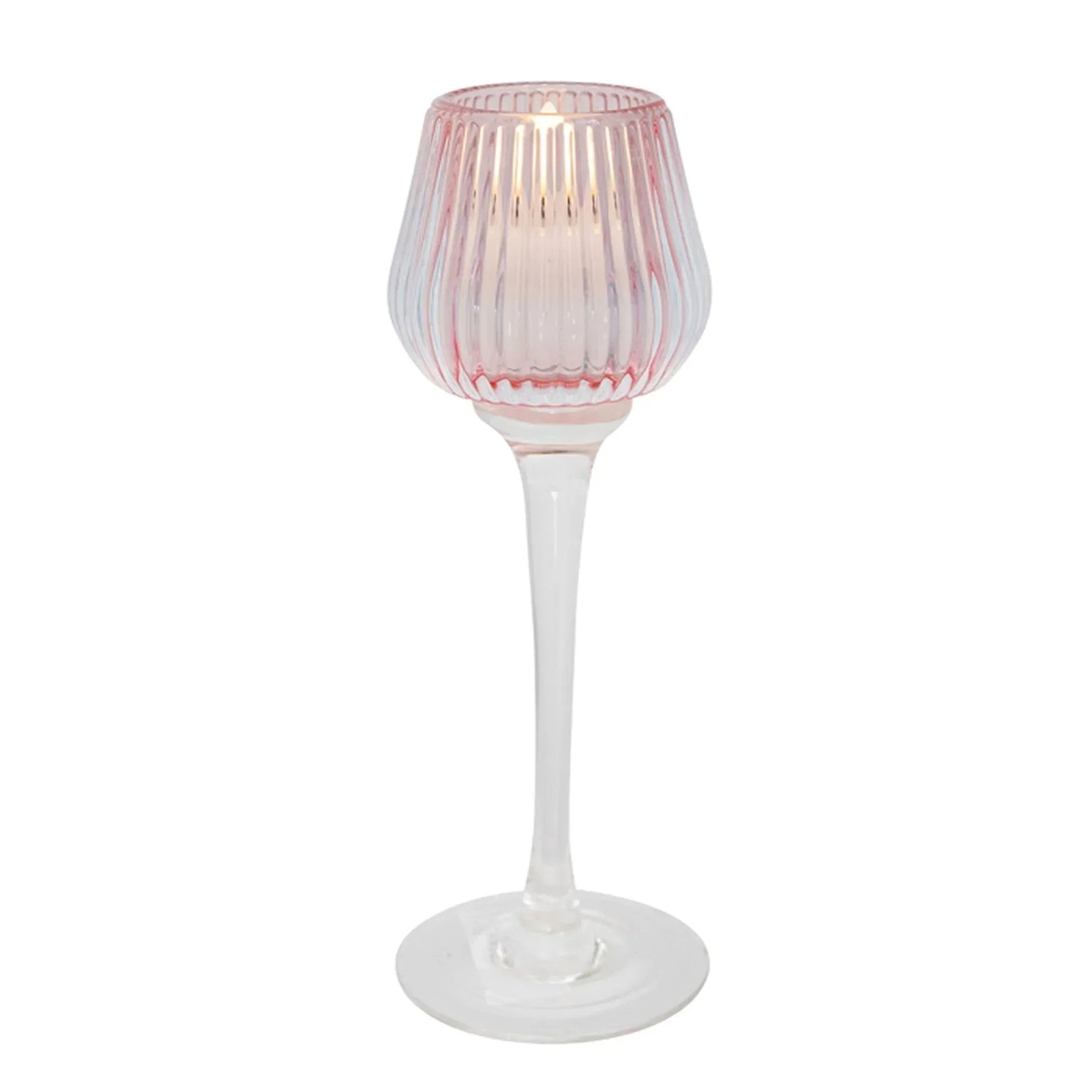 Pink ribbed glass candle holder with stem, elegant home décor accent for ambient lighting