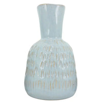 Light blue ceramic vase with textured pattern, elegant home décor accent piece