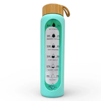 Mint green time-tracking water bottle with bamboo lid, motivational hydration reminders, and carry loop for daily wellness.