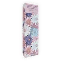 Quiet Blossom rollerball pen in floral packaging with pastel daisies, perfect for elegant home décor or gifting.
