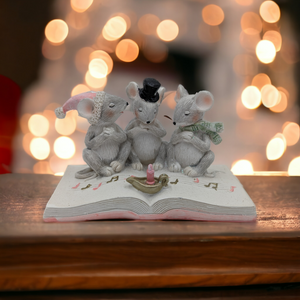 Caroling Mice on a Book