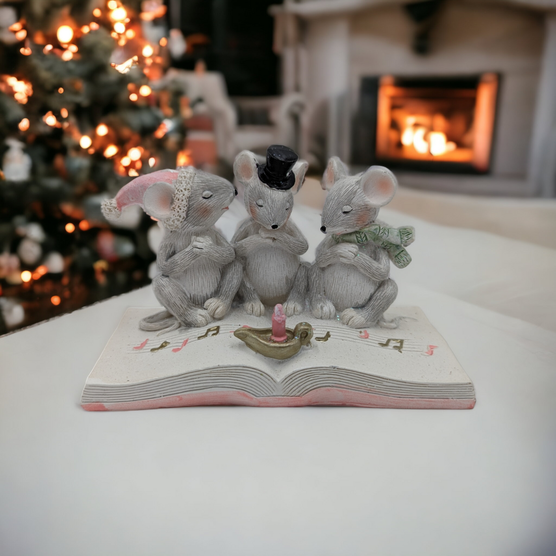 Caroling Mice on a Book