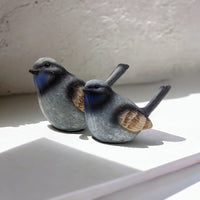 Two blue-throated bird figurines, home décor accents for shelves or mantels