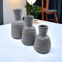 Set of three grey textured ceramic vases with gold accents, modern home décor for living room or dining table