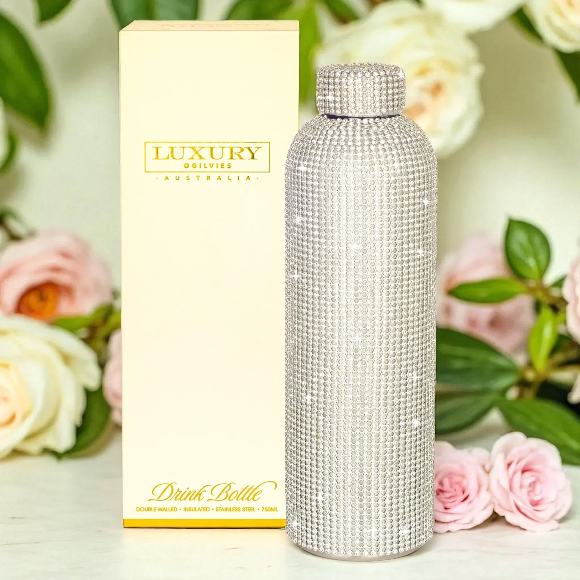 Luxury crystal-encrusted stainless steel drink bottle with floral backdrop, 750ml capacity