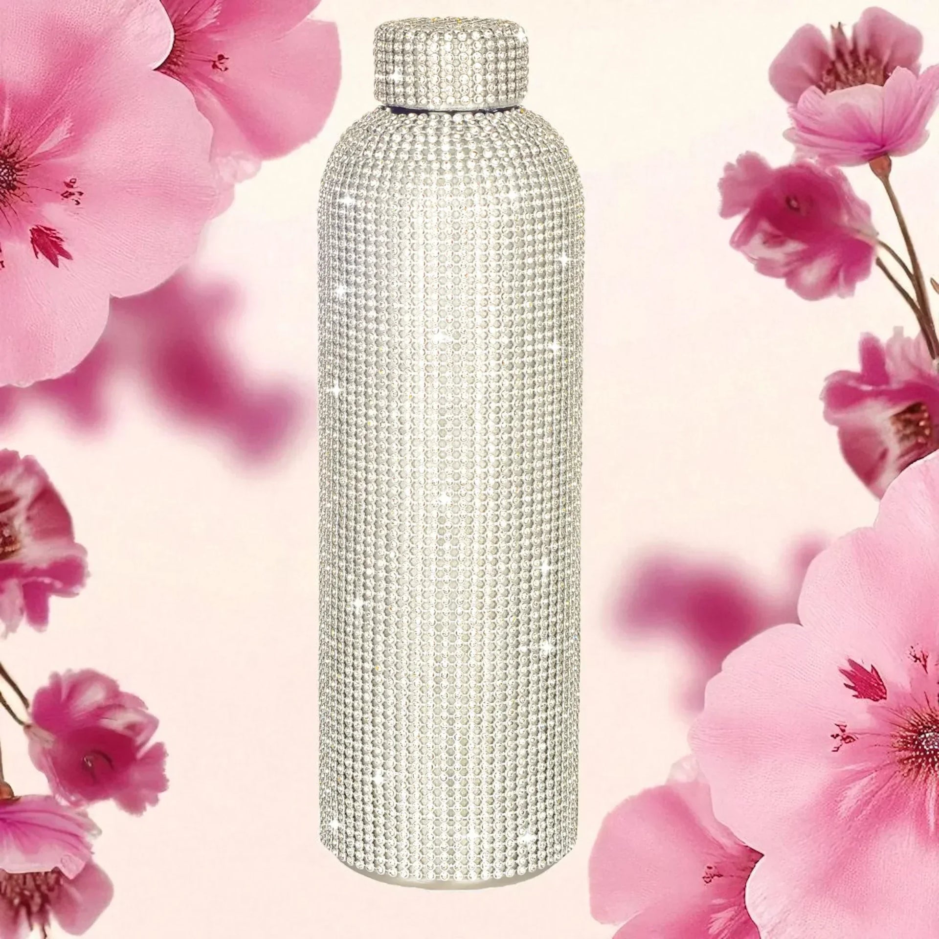 Sparkling crystal-encrusted water bottle with pink floral backdrop, luxury home decor accessory