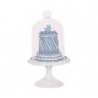 Elegant blue cake under glass dome on white pedestal, vintage home decor accent piece